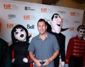 To his credit, Sandler is the least terrifying thing in this picture. It's always the cosplayers...